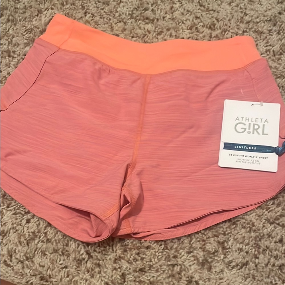 NWT Athleta Girl SB Run The World 3” Short with liner. Sz M/8-10. Color Peach
